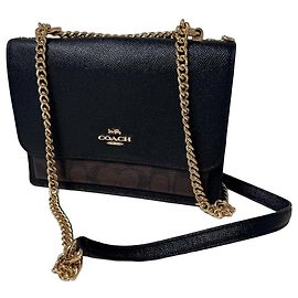 Borsa a tracolla Coach in pelle nera e monogramma marrone