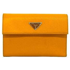 Portafoglio bi-fold in nylon con placca logo Triangle Prada
