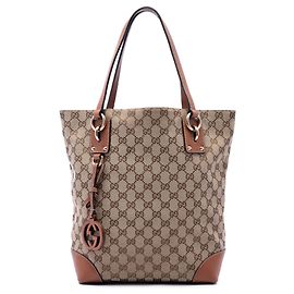 Tote Gucci GG Canvas con charm GG Marrone