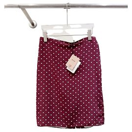 Falda Miu Miu de seda con estampado de lunares bordeaux