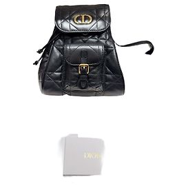 Mini mochila Dior Caro em couro preto e dourado