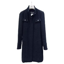 Abrigo Chanel de tweed negro
