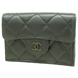 Portafoglio tri-fold Chanel in pelle d'agnello nera