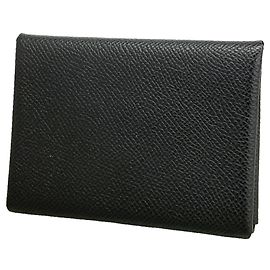 Hermès Cartera/Monedero Hermes Calvi Duo en piel negra
