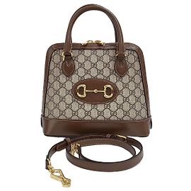 Gucci Mini borsa crossbody con manico superiore e morsetto marrone