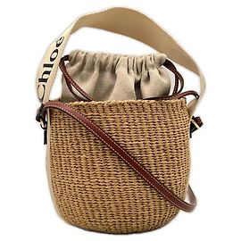 Borsa a tracolla Chloé Woody Small Basket in rafia e lino