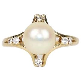 Anillo Mikimoto de oro amarillo 18K con perla y diamante, talla 53