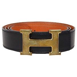 Hermès Cinturón reversible Hermes Black/Orange en cuero Box Calf y Togo con hebilla H