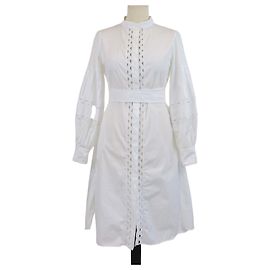 Autre Marque Vestido midi de manga larga con cinturón y detalles calados en algodón blanco CH Carolina Herrera