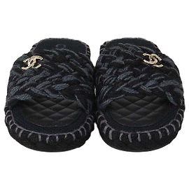 Ciabatte basse Chanel in tessuto intrecciato CC Nero/Grigio