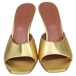Sandali slide Lupita in pelle dorata Amina Muaddi