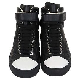 Chanel High Top Sneaker aus gestepptem Leder CC Schwarz/Weiß