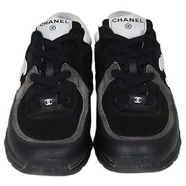 Chanel CC Low Top Sneaker aus Mesh und Leder Schwarz/Weiß