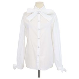 Túnica de manga larga en algodón blanco con lazo Chanel