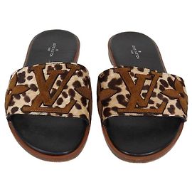 Sandali bassi Lock It Louis Vuitton in pelo di vitello leopard marrone e camoscio con monogramma