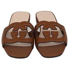 Gucci Ciabatte flat in pelle marrone con G interlocking traforata