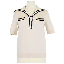 Polo a Maniche Corte in Lana Beige/Nero con Catena Horsebit Gucci