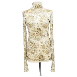 Top de cuello alto de velur con estampado floral Ganni Perle Beige