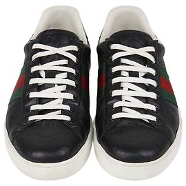 Sneakers basse classiche Ace in pelle Guccissima nera Gucci
