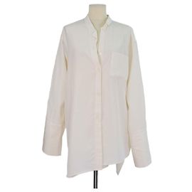 Blusa oversize a maniche lunghe in seta crema con tasca Anagram Loewe