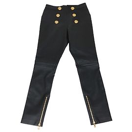 Leggings Balmain de cuero negro con botones decorativos
