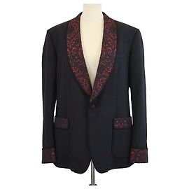 Smoking Dolce & Gabbana in misto lana nero/rosso con ricami paisley