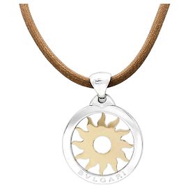 Colgante Bulgari, "Tondo Sun", oro amarillo y acero.
