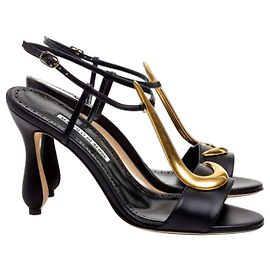 Manolo Blahnik Sandali in pelle nera dettaglio oro