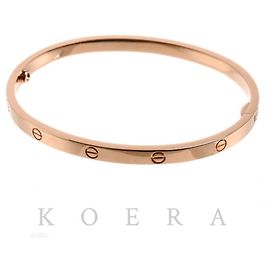 Bracciale con charm Cartier in oro rosa 18K