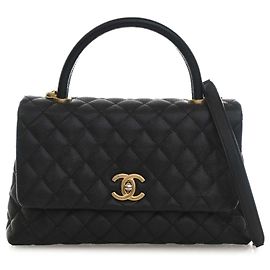Borsa Chanel Coco Top Handle Medium in pelle caviar matelassé nera