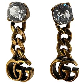 Orecchini a goccia Gucci GG con cristalli in ottone dorato