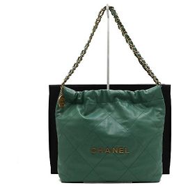 Chanel Picca borsa a tracolla e crossbody in metallo dorato