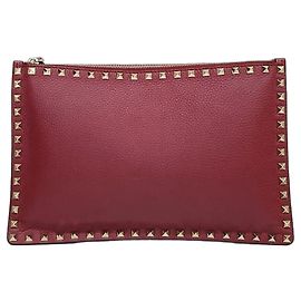 Valentino Clutch in pelle martellata con borchie Burgundy