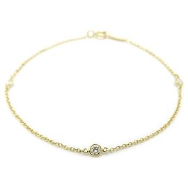 Bracciale con charm Tiffany & Co. in oro giallo 18K