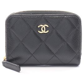 Monedero con cremallera Chanel Classic en piel de becerro granulada negra