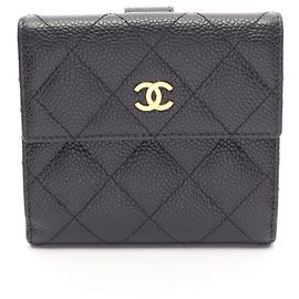 Cartera Chanel Matelassé con doble botón a presión