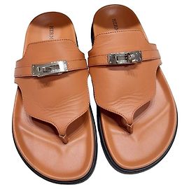 Mules y zuecos Hermès de cuero color camel talla 36