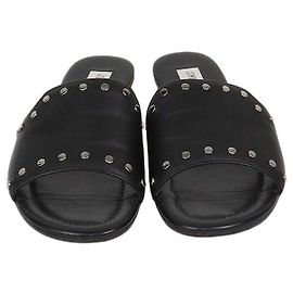 Sandali bassi Nanda con borchie in pelle nera Jimmy Choo