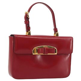 Bolso de mano PRADA de piel rojo y dorado