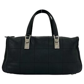 Mini borsa Boston Chanel in pelle nera