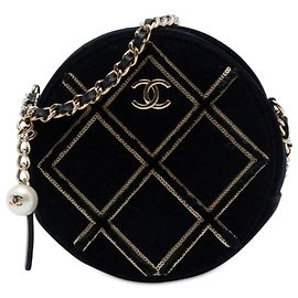 Chanel Borsa crossbody rotonda in velluto nero con perle e paillettes