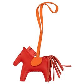 Hermès Grigri Rodeo Bag Charm PM in pelle di agnello Milo rossa