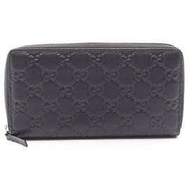 Cartera larga redonda Gucci Guccissima