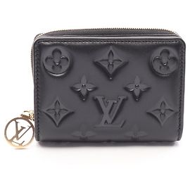 Louis Vuitton Portefeuille Lou Monogram Embossed Bi-fold Wallet