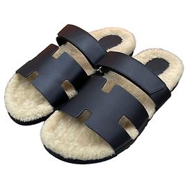 Hermès Sandali in shearling Nero