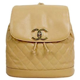 Chanel Zaino a patta trapuntato in pelle caviar beige