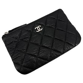Chanel Mini Pochette Caviar Nera in Pelle