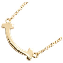 Collar Tiffany & Co. T Smile Mini en oro amarillo de 18K