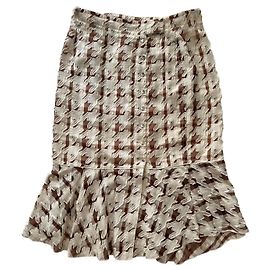 Falda Nina Ricci con estampado pied-de-poule y volante
