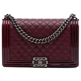 Borsa a tracolla Boy Flap Chanel Medium in pelle di capra trapuntata e vernice rossa